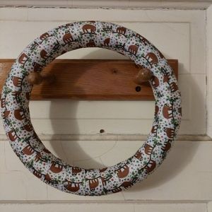 8in foam wreath with sloth ribbon wrap